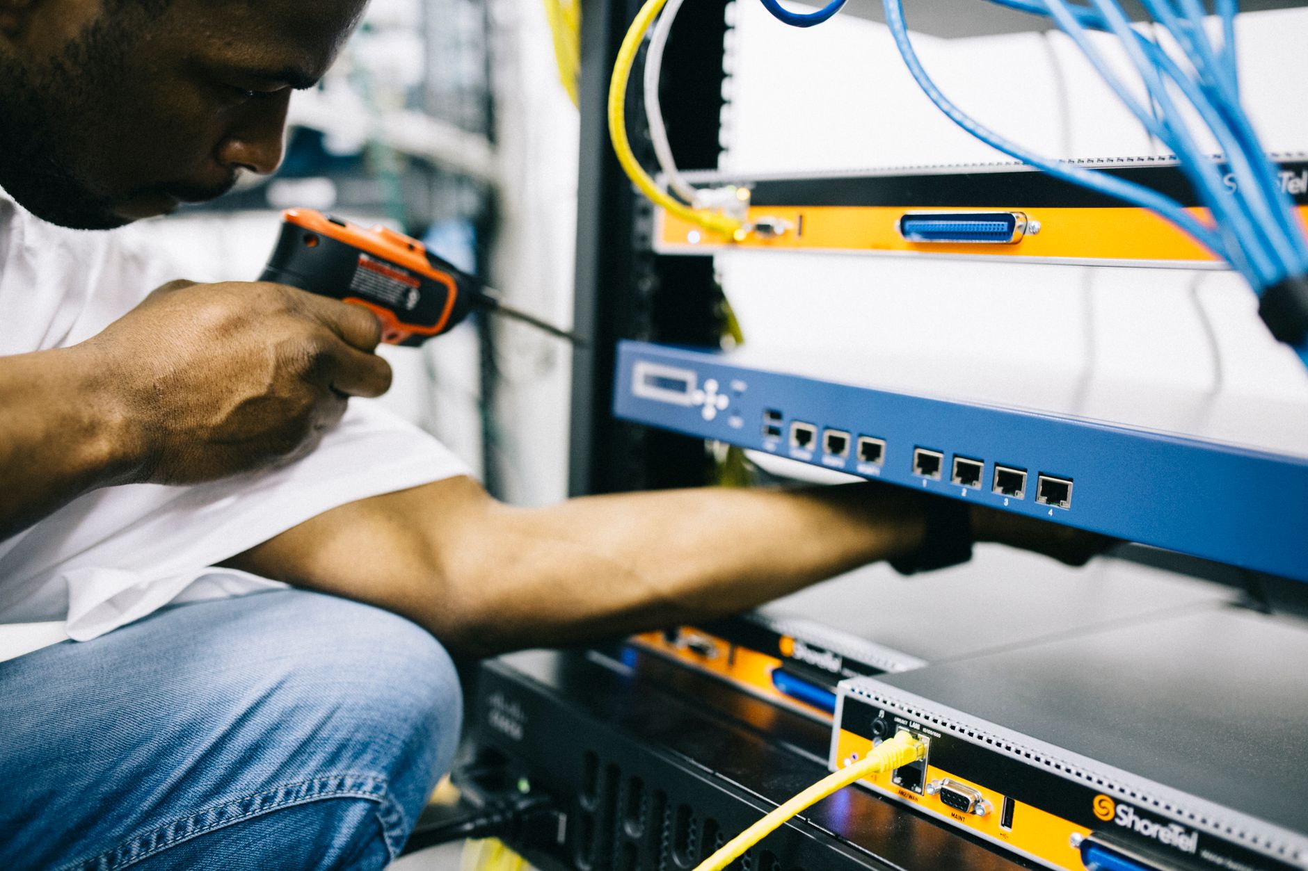 Telecommunications engineers working in Doha